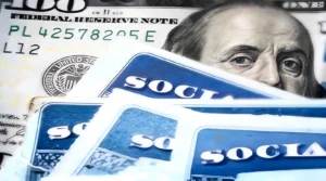 Older couple reviewing a Social Security statement and planning for the 2027 COLA